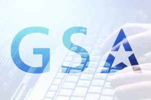 GSA AI tools concept showing hands typing on a keyboard with transparent GSA logo overlay, symbolizing federal adoption of artificial intelligence solutions.