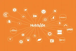Diagram showing HubSpot consultant integrations with multiple third-party tools and platforms, connected to the central HubSpot logo on an orange background.