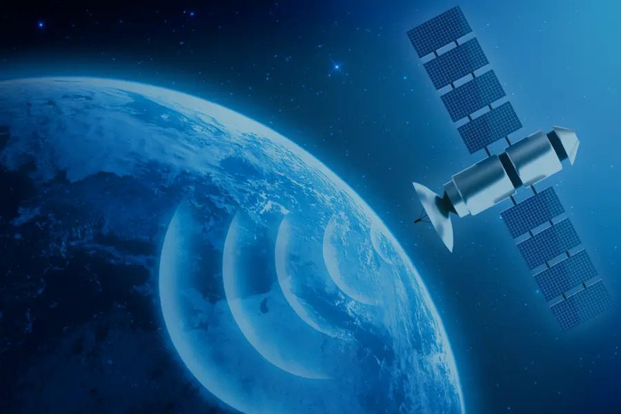 A sattelitter orbiting Earth with communication signals, representing global satellite technology and space-based data transmission.