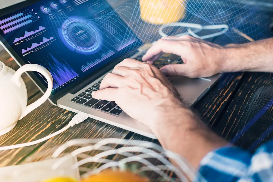 harnessing technology: Image showing professionals harnessing technology in the workplace to improve productivity and efficiency. Focus on modern tools and innovative tech solutions.